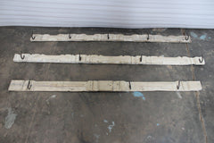 Three wooden carved panels with hooks