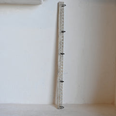 Reclaimed vintage carved wooden panel with 5 hooks on a white background