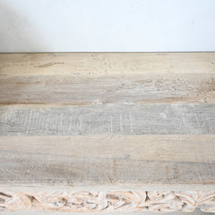 Close-up of a wooden surface with a rustic finish