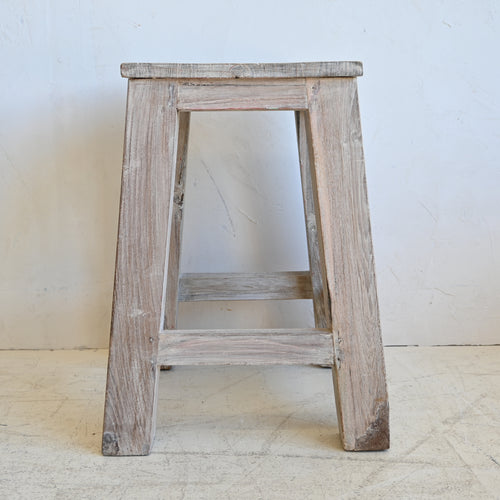 Wooden stool with a white background